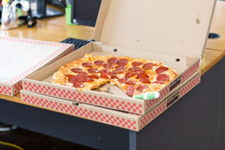 pizza-delivered-at-office delivery pizza sitting in box at office