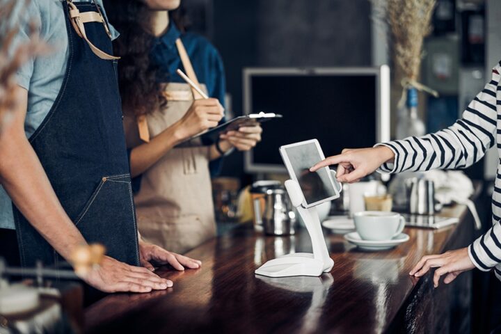 customer self service order drink menu with tablet screen at caf staffing issues in restaurants