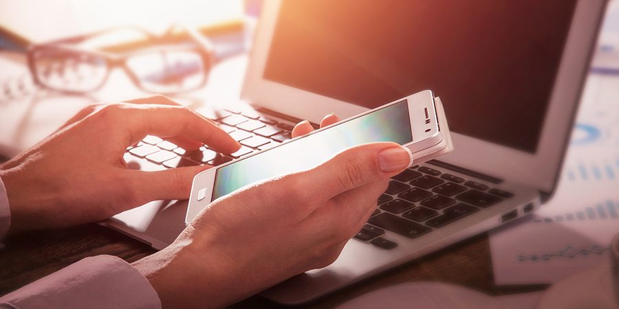 Close up of female hands making online payment Close up of female hands making payment. Online shopping